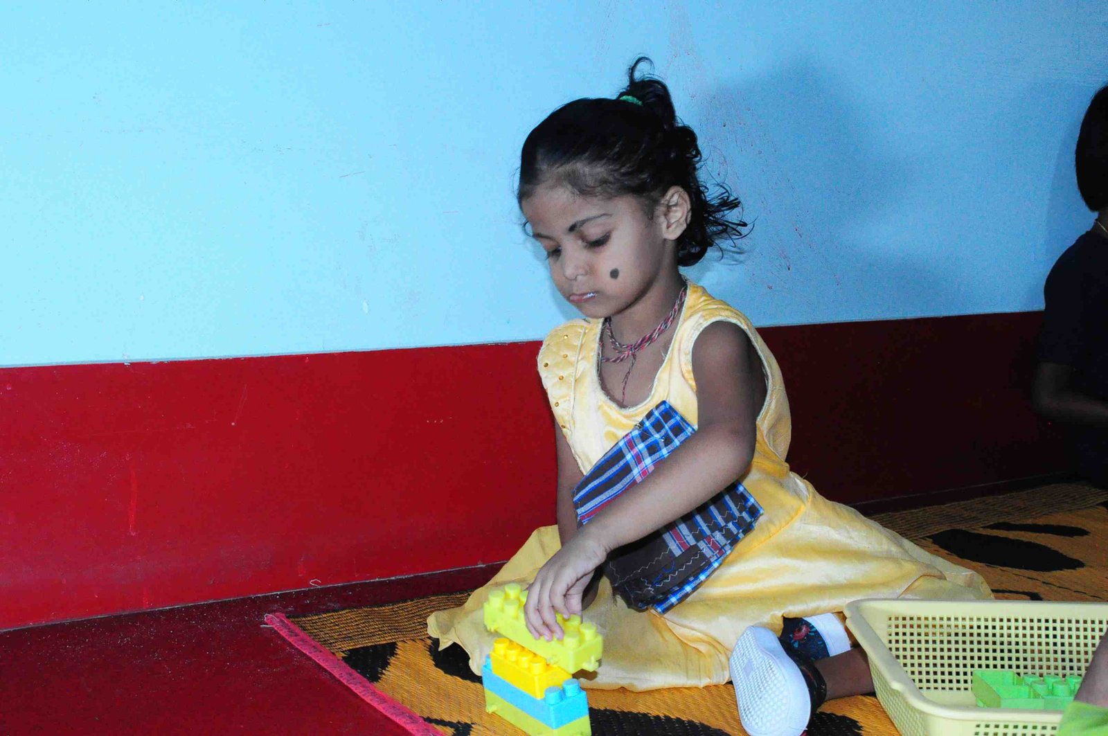 Child receiving therapy support